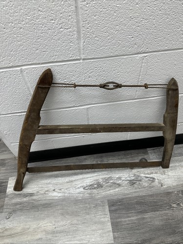 Antique firewood bucksaw bow - antique, bucksaw,